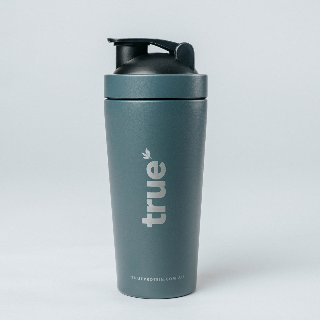 Navy True Protein stainless steel shaker bottle with black flip lid and vertical "true" logo, product image for TrueProtein.com.au (Australia)
