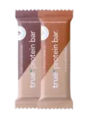 Two True Protein Bar packages (brown and orange wrappers), front view — high-protein snack bar product image for e-commerce.